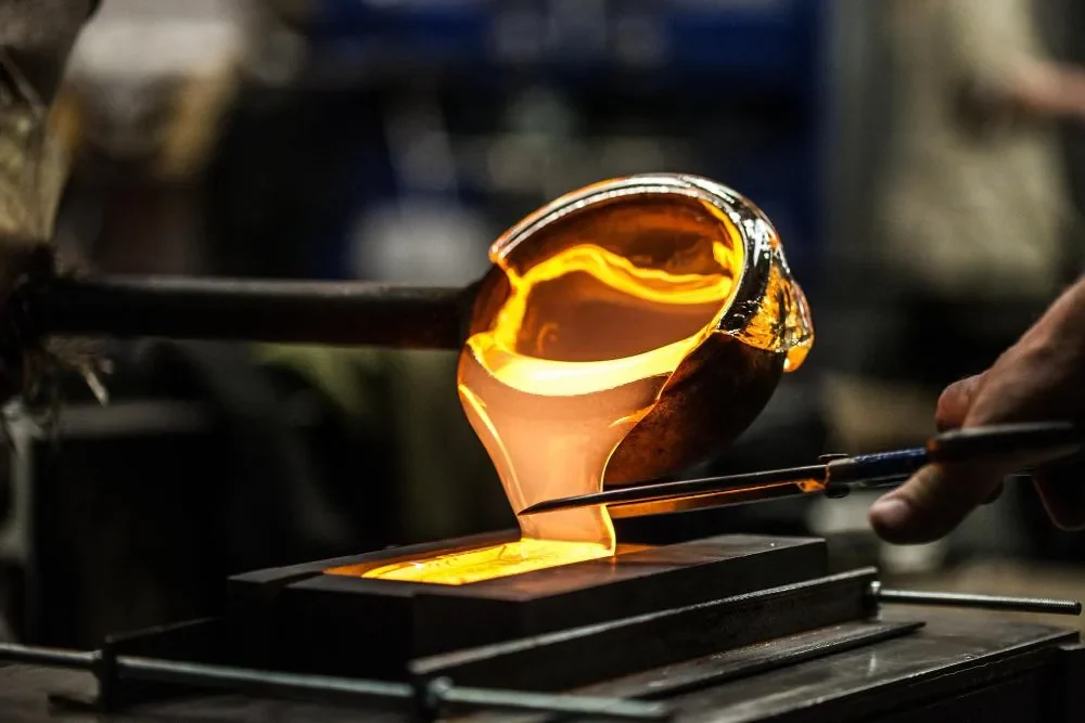 Molten gold being poured into a mould